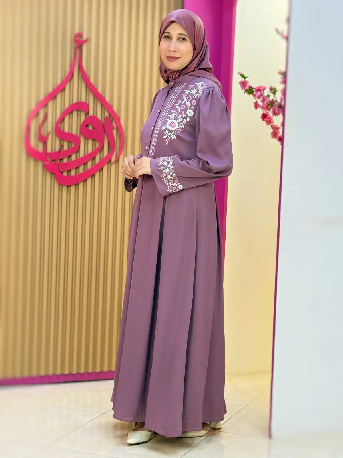 فستان نضال مورتاديلا