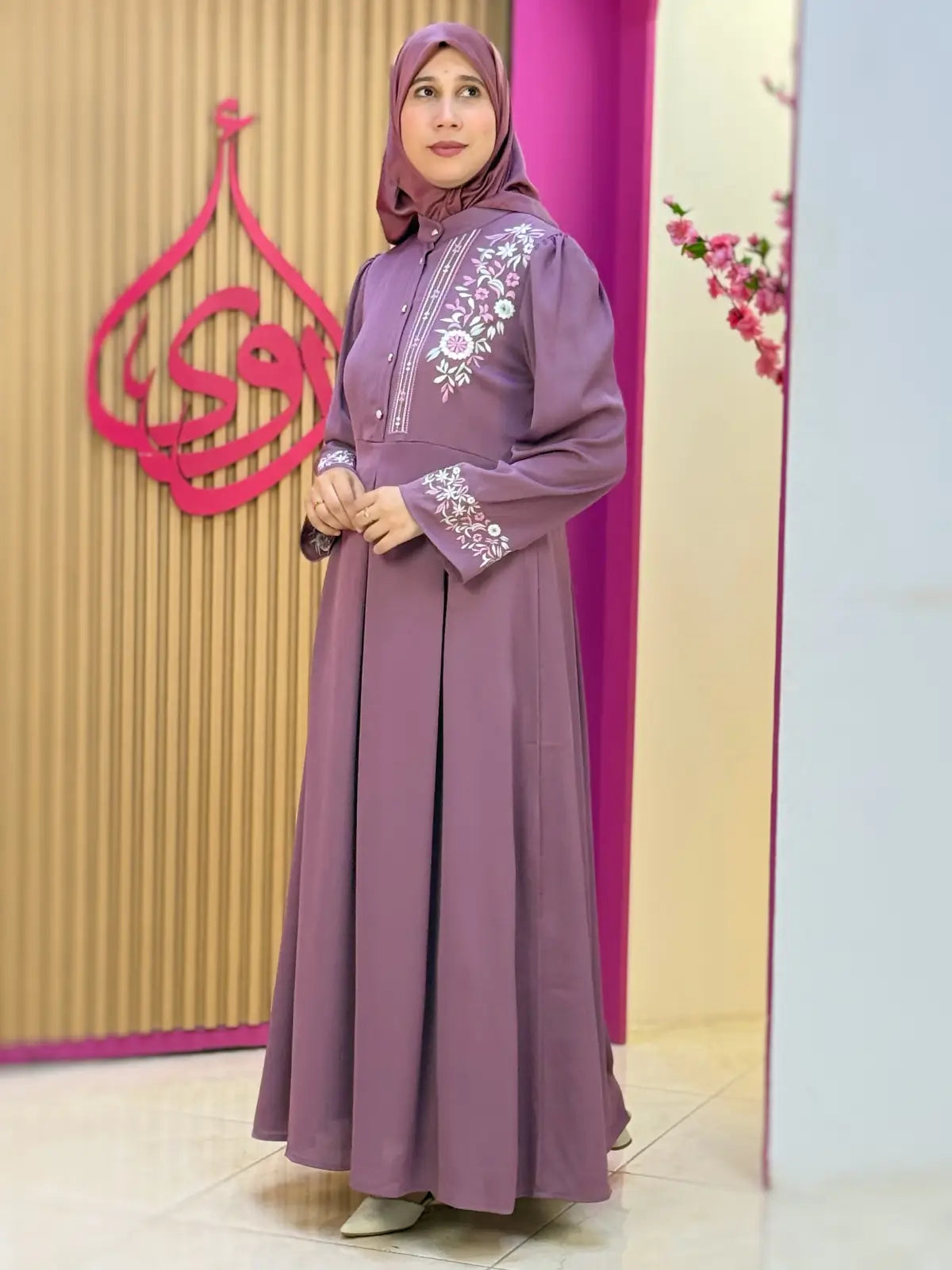 فستان نضال مورتاديلا