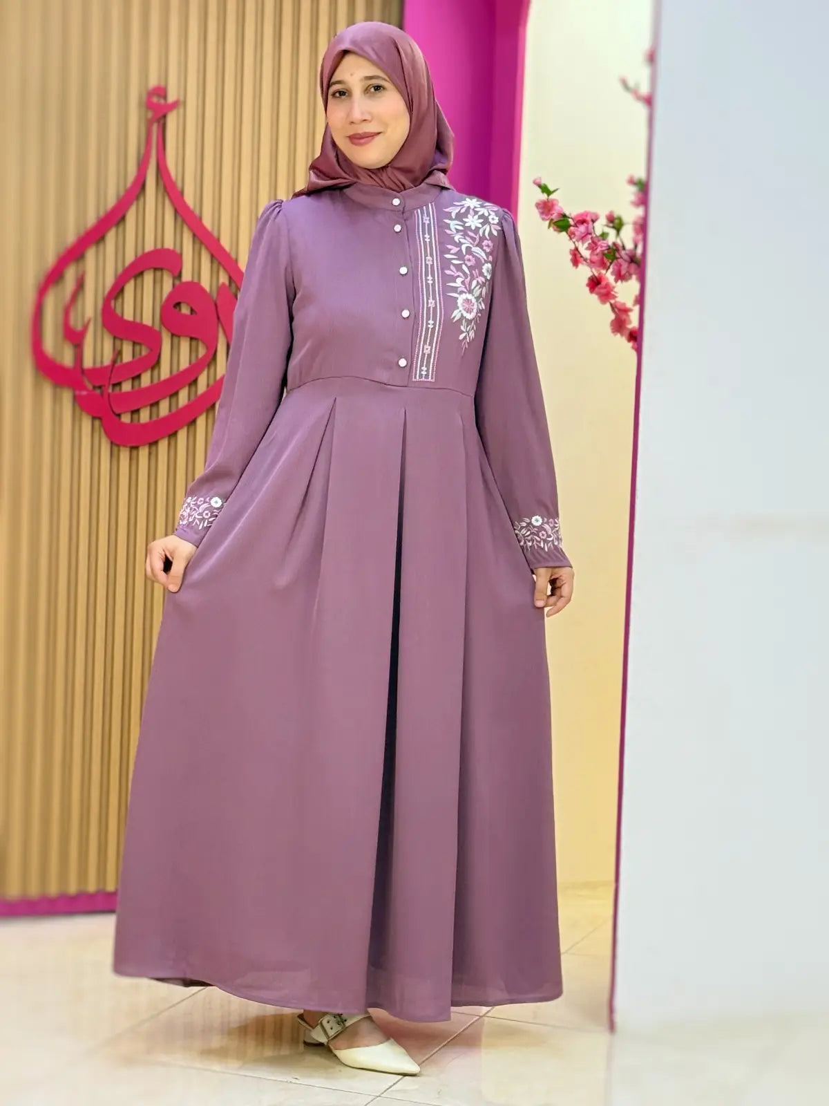 فستان نضال مورتاديلا