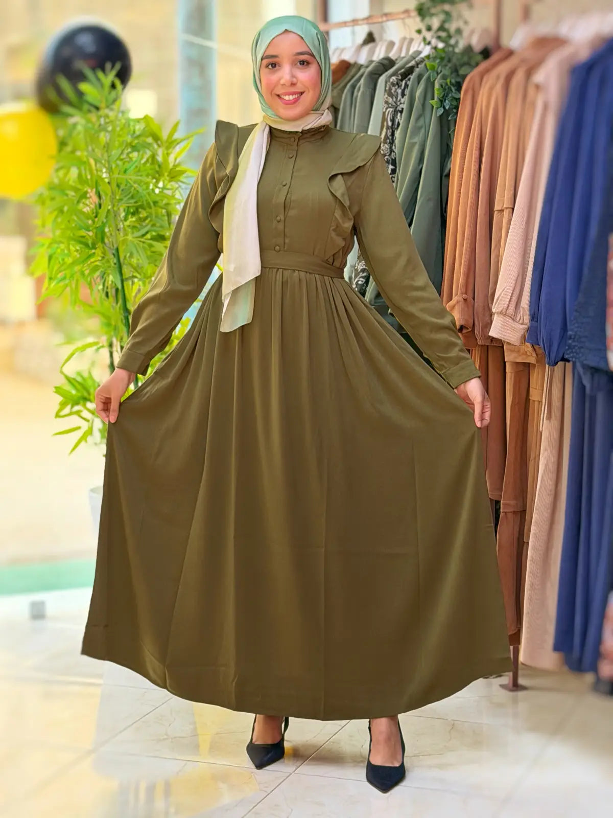 فستان جواهر أخضر